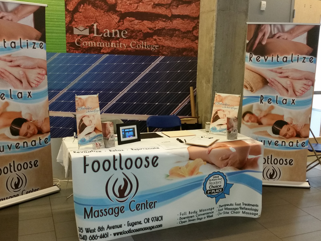 Footloose Massage Center elaborate table setup at the 2018 Lane Community College (LCC) Job Fair